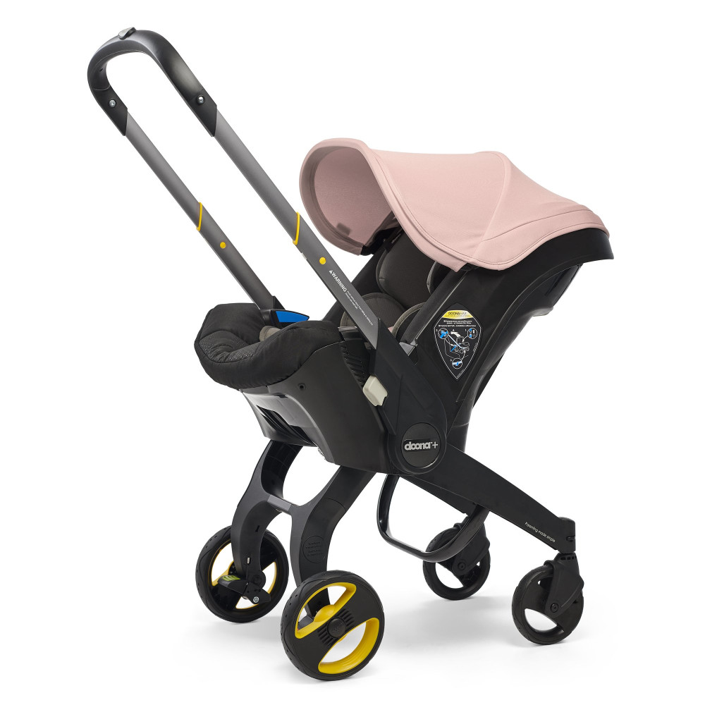 Doona + - автокресло-коляска для новорожденного (1,8 - 13 кг), коляска для путешествий, использование в самолете • Blush Pink Doona + - автокресло-коляска для новорожденного (1,8 - 13 кг), коляска для путешествий, использование в самолете • Blush Pink