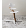 Stokke Nomi - стільчик для годування, багатофункціональний стілець-трансформер (від народження до 150 кг) • Walnut White (626701)