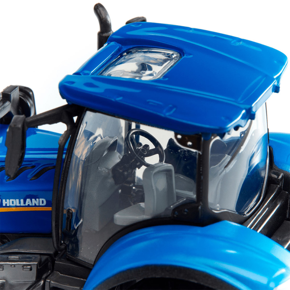 Автомодель Bburago Farm Трактор New Holland T7.315 (18-31632) Автомодель Bburago Farm Трактор New Holland T7.315 (18-31632)
