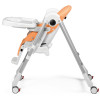 Peg Perego Prima Pappa Follow Me - стільчик для годування, шезлонг для новонароджених (регулювання по висоті, нахил спинки, регулювання підніжки), чохол з екошкіри, 4 колеса, компактне складання • Peach