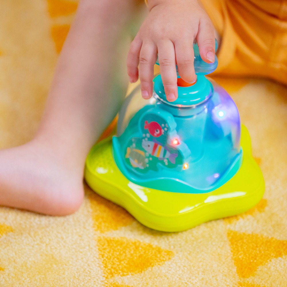 Дзиґа музична Bright Starts "Press & Glow Spinner"