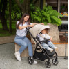 Carrello Bravo Lite CRL-5529 - прогулянкова коляска з підсвіткою, всесезонний візок, телескопічне регулювання ручки, великі колеса, захист від сповзання, зручно складається • Marble Beige