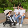 Carrello Bravo Lite CRL-5529 - прогулянкова коляска з підсвіткою, всесезонний візок, телескопічне регулювання ручки, великі колеса, захист від сповзання, зручно складається • Marble Beige