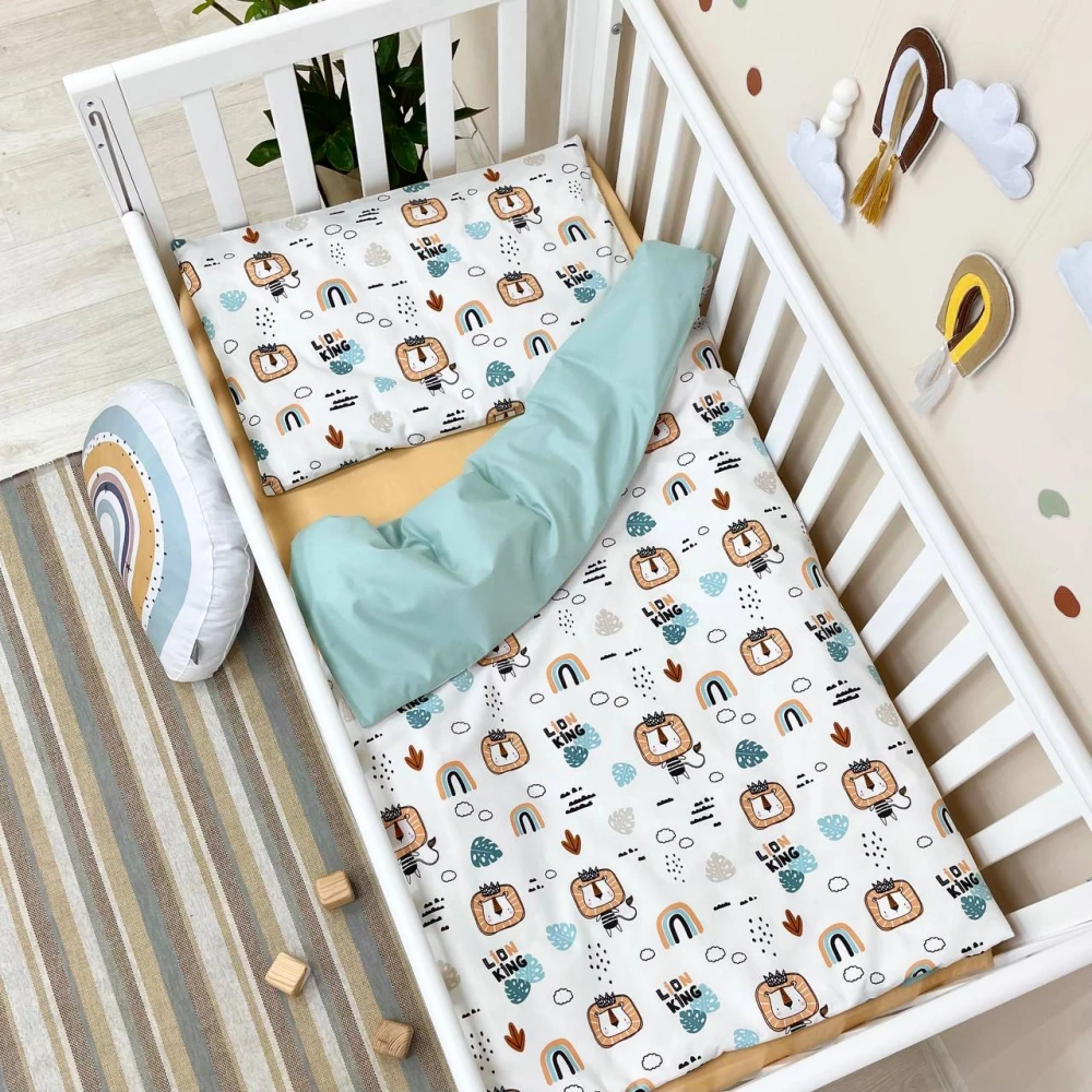 Змінна постіль Маленька Соня Baby Dream Леви з веселками Mint