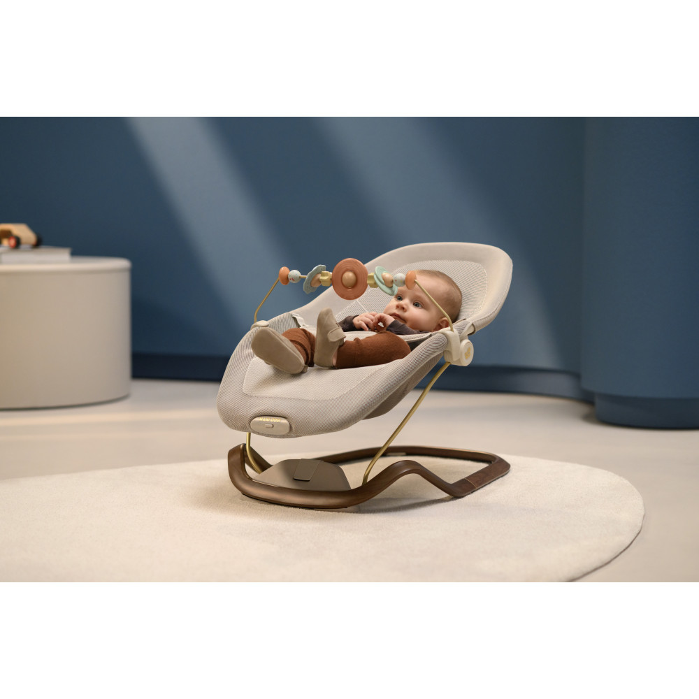 Maxi-Cosi Dove Pro - лёгкое и компактное кресло-качалка для новорождённого с игрушками • Elegance Bronze