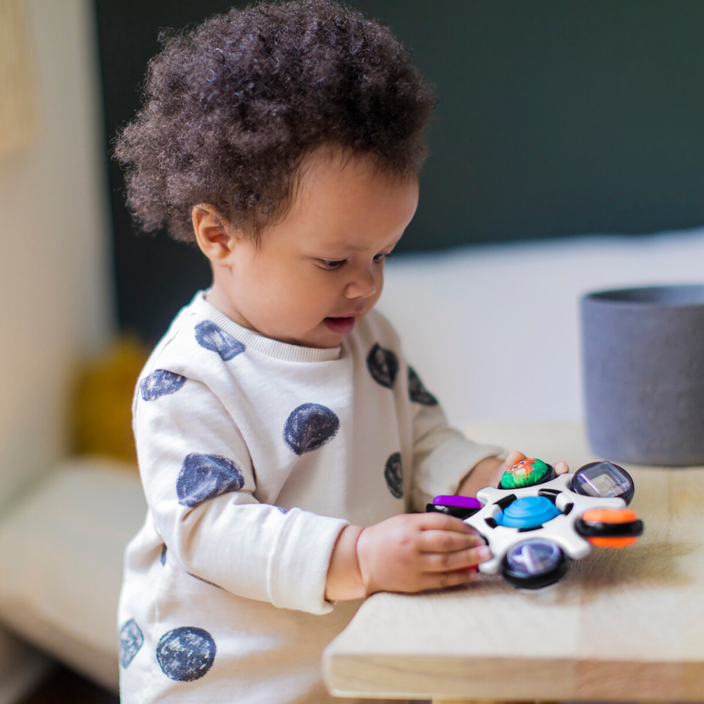 Baby Einstein Curiosity Clutch - розвиваюча іграшка-брязкальце з 6 фігурками від 3 місяців