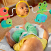 Bright Starts Playful Paradise - шезлонг з вібрацією та ігровою дугою з 4 іграшками