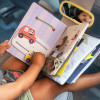 Taf Toys Книжка путешественника - развивающий центр для автомобиля (13825)
