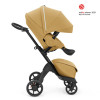 Stokke Xplory X - детская прогулочная коляска с реверсивным блоком (сиденье устанавливается лицом к маме), компактное складывание • Золотисто-желтый (571405)