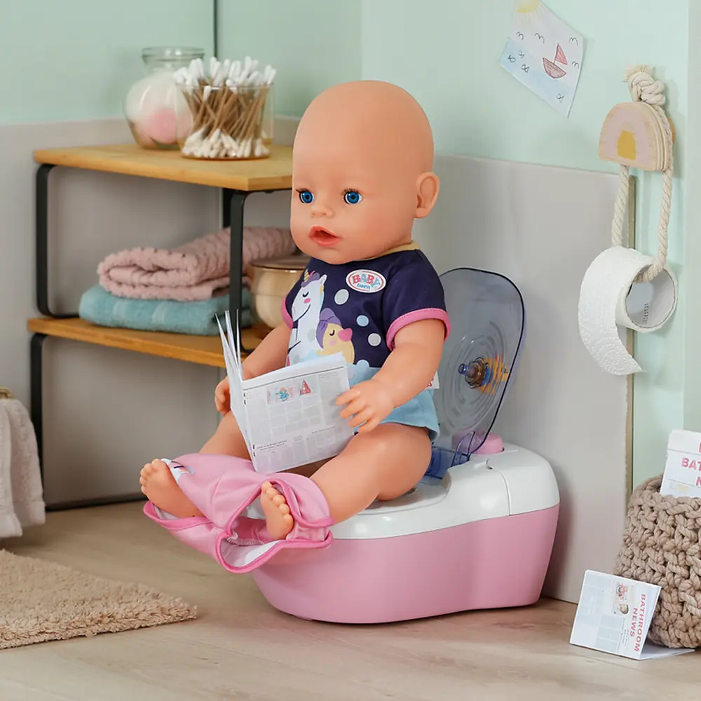 Лялька BABY born сидить на унітазику з книжкою