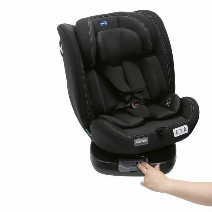 Кнопка повороту сидіння на 360° в основі автокрісла Chicco Unico Evo