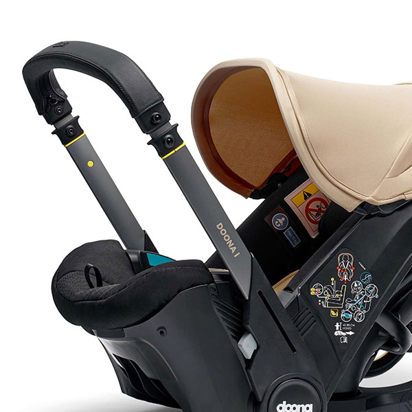 Телескопічна ручка Doona i автокрісло-коляска