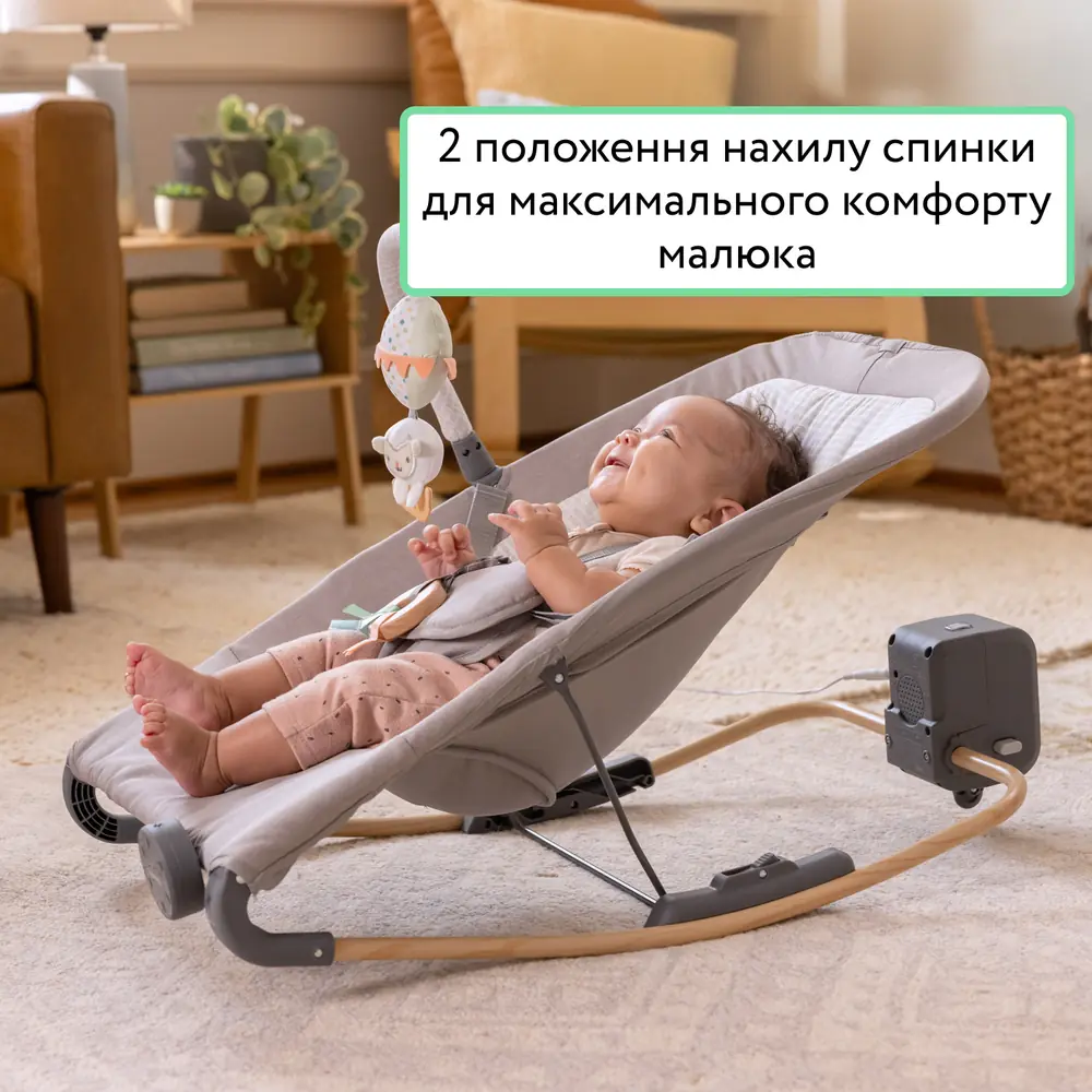 Малюк напівлежить у шезлонгу Ingenuity Keep InMotion Soulful Skies