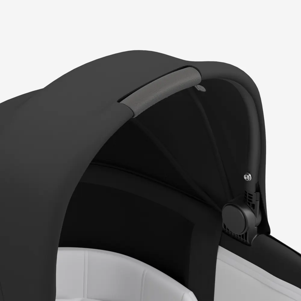 Встроенная ручка в капюшоне люльки Cybex Priam Lux