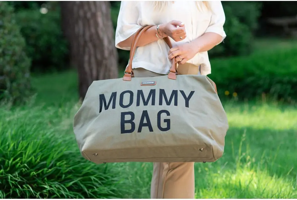 Сумка для мамы Childhome Mommy Bag в руке