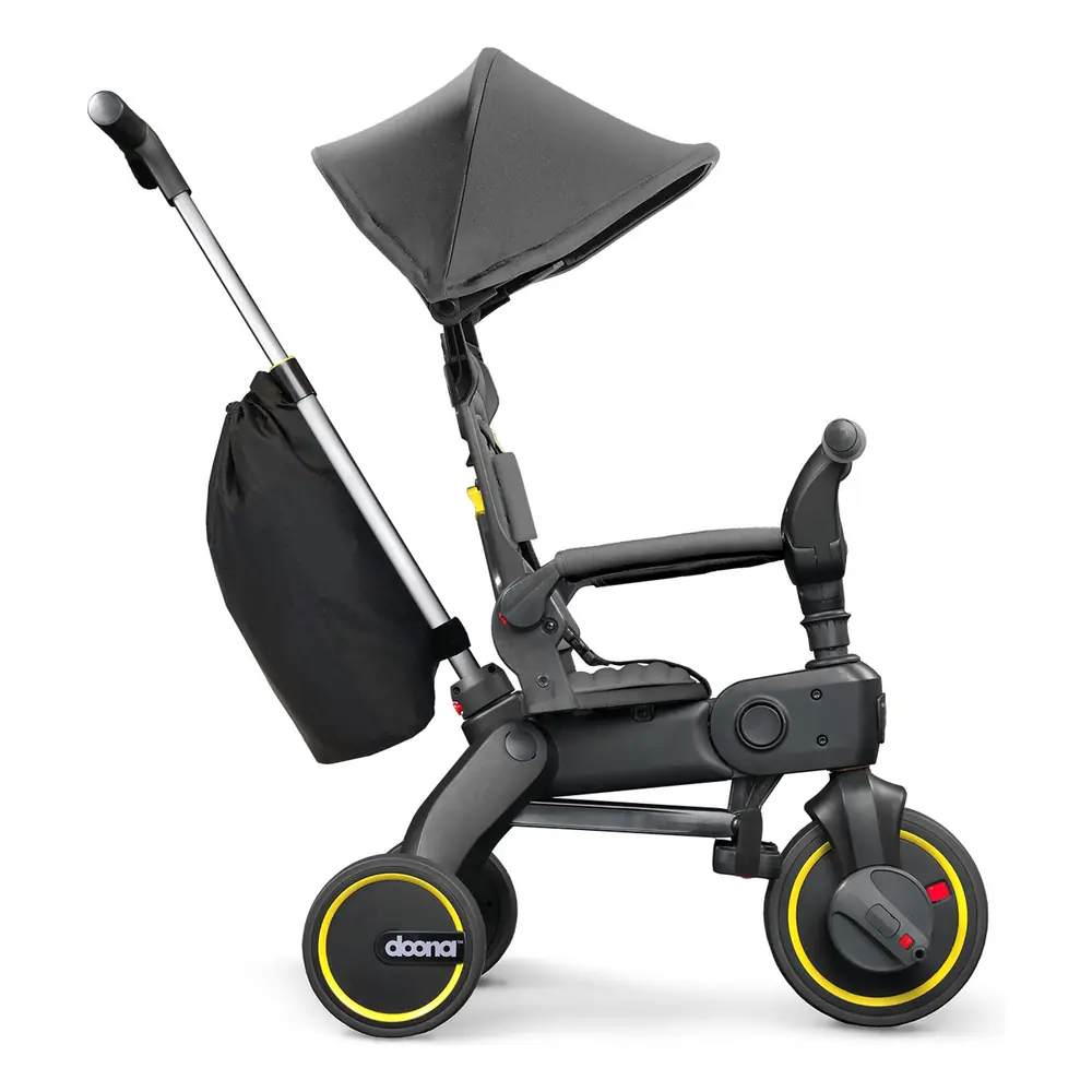 Doona Liki Trike S3 в режиме с родительской ручкой для возраста от 10 до 18 месяцев